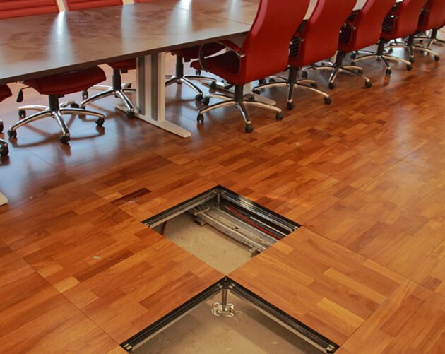 natural wood covered raised flooring in meeting room
